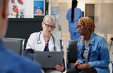 senior medic showing diagnosis